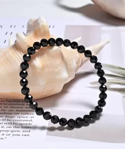 Elastisches Spinell Armband schwarz mit 6mm Kugeln